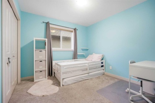 107 Everwoods Park Sw, Calgary, AB - Indoor Photo Showing Bedroom