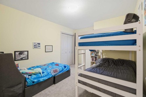 107 Everwoods Park Sw, Calgary, AB - Indoor Photo Showing Bedroom