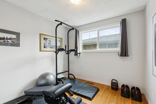 3215 Boulton Road Nw, Calgary, AB - Indoor Photo Showing Gym Room