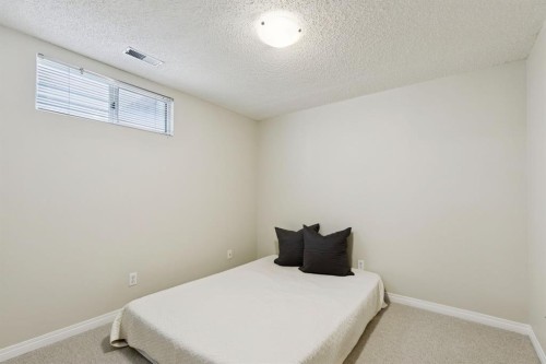 3215 Boulton Road Nw, Calgary, AB - Indoor Photo Showing Bedroom