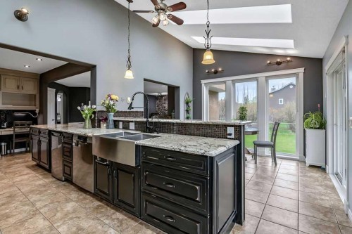 1105 Turner Gate Sw, Diamond Valley, AB - Indoor Photo Showing Kitchen With Upgraded Kitchen