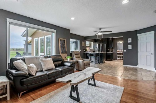 1105 Turner Gate Sw, Diamond Valley, AB - Indoor Photo Showing Living Room