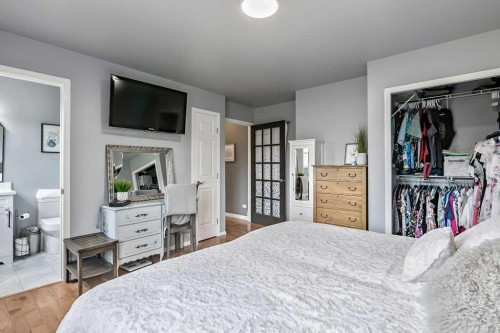 1105 Turner Gate Sw, Diamond Valley, AB - Indoor Photo Showing Bedroom