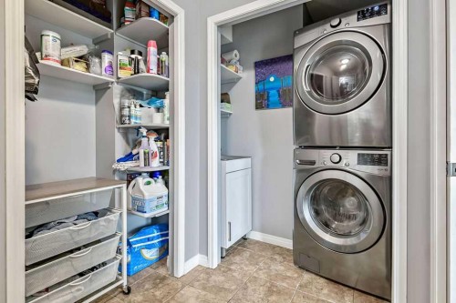 1105 Turner Gate Sw, Diamond Valley, AB - Indoor Photo Showing Laundry Room