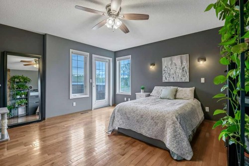 1105 Turner Gate Sw, Diamond Valley, AB - Indoor Photo Showing Bedroom