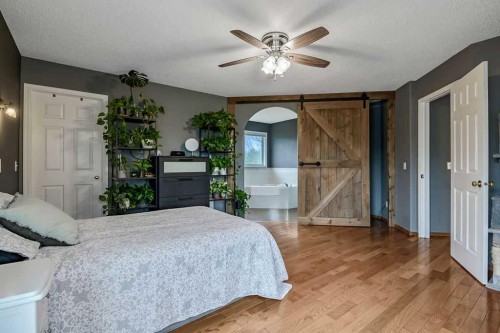 1105 Turner Gate Sw, Diamond Valley, AB - Indoor Photo Showing Bedroom