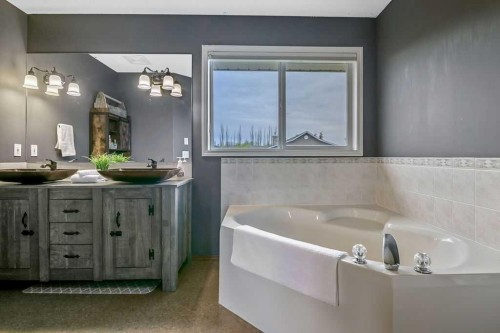 1105 Turner Gate Sw, Diamond Valley, AB - Indoor Photo Showing Bathroom