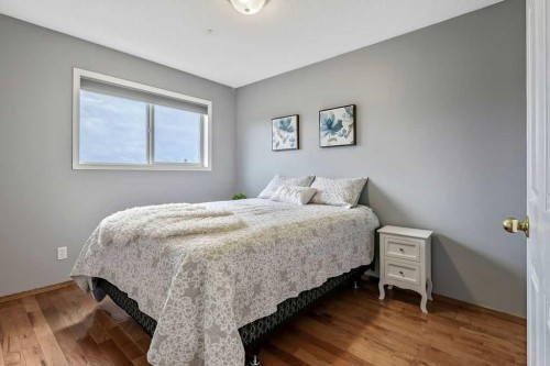 1105 Turner Gate Sw, Diamond Valley, AB - Indoor Photo Showing Bedroom