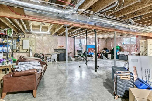 1105 Turner Gate Sw, Diamond Valley, AB - Indoor Photo Showing Basement