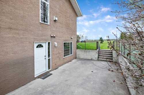 1105 Turner Gate Sw, Diamond Valley, AB - Outdoor With Exterior