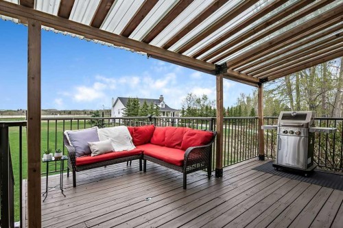 1105 Turner Gate Sw, Diamond Valley, AB - Outdoor With Deck Patio Veranda With Exterior