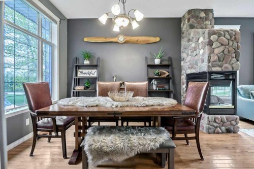 1105 Turner Gate Sw, Diamond Valley, AB - Indoor Photo Showing Dining Room