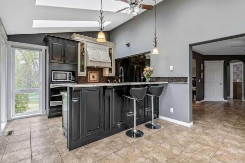 1105 Turner Gate Sw, Diamond Valley, AB - Indoor Photo Showing Kitchen