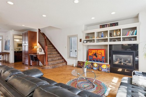 2405 Bowness Road Nw, Calgary, AB - Indoor Photo Showing Living Room With Fireplace