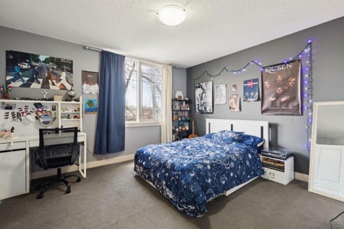 2405 Bowness Road Nw, Calgary, AB - Indoor Photo Showing Bedroom
