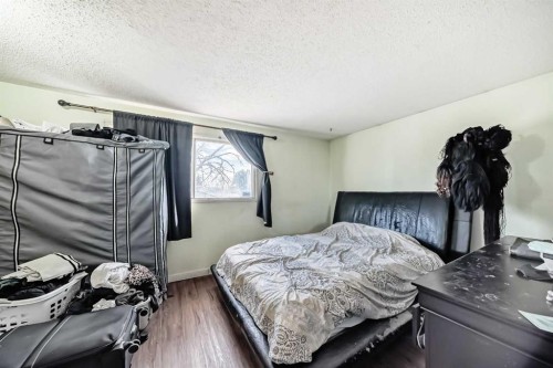 4 Fonda Crescent Se, Calgary, AB - Indoor Photo Showing Bedroom