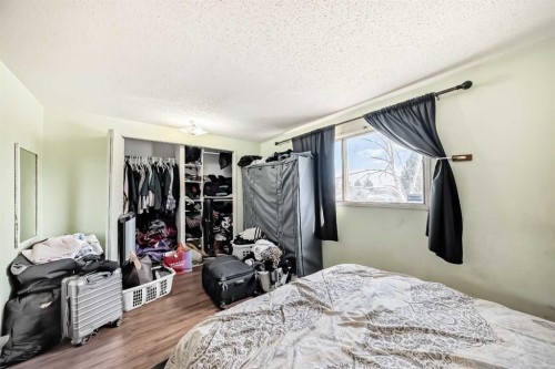 4 Fonda Crescent Se, Calgary, AB - Indoor Photo Showing Bedroom