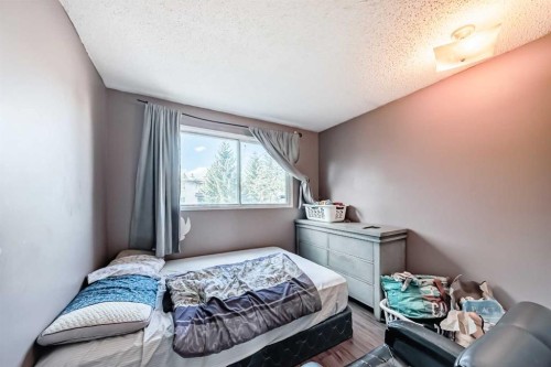 4 Fonda Crescent Se, Calgary, AB - Indoor Photo Showing Bedroom