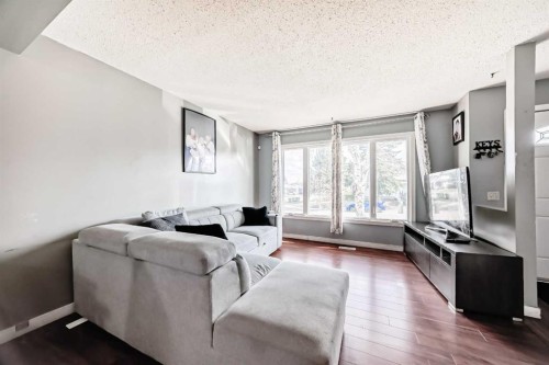 4 Fonda Crescent Se, Calgary, AB - Indoor Photo Showing Living Room