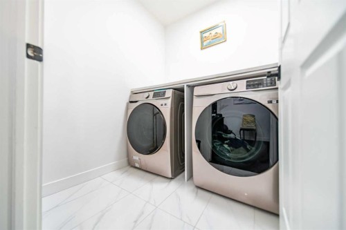 9 Scripps Landing Nw, Calgary, AB - Indoor Photo Showing Laundry Room