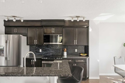 177 Walden Manor Se, Calgary, AB - Indoor Photo Showing Kitchen With Upgraded Kitchen