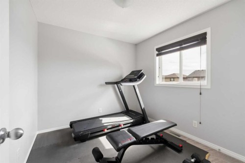 177 Walden Manor Se, Calgary, AB - Indoor Photo Showing Gym Room