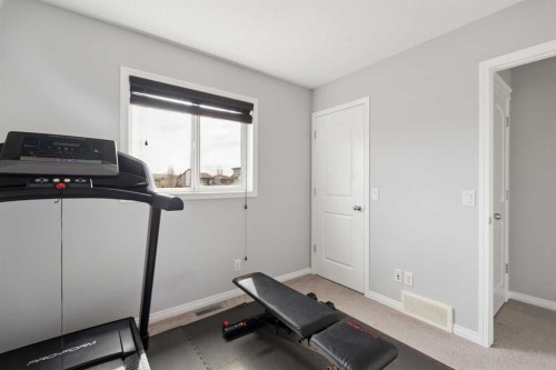 177 Walden Manor Se, Calgary, AB - Indoor Photo Showing Gym Room