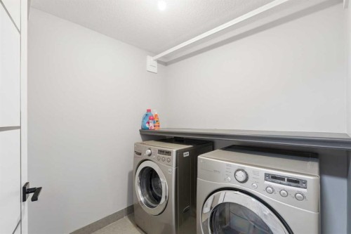 177 Walden Manor Se, Calgary, AB - Indoor Photo Showing Laundry Room