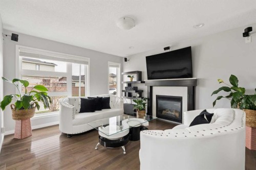 177 Walden Manor Se, Calgary, AB - Indoor Photo Showing Living Room With Fireplace