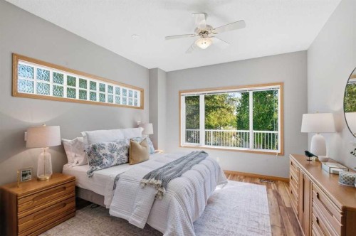 545 Rocky Ridge Bay Nw, Calgary, AB - Indoor Photo Showing Bedroom