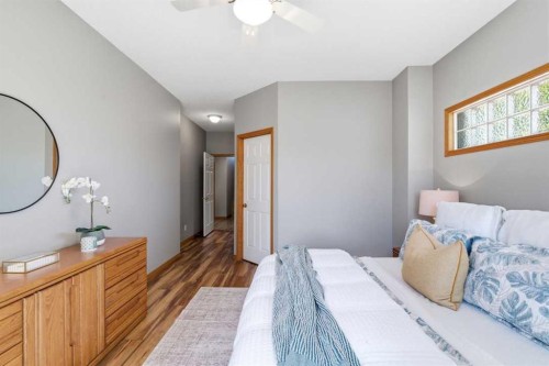 545 Rocky Ridge Bay Nw, Calgary, AB - Indoor Photo Showing Bedroom