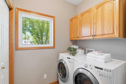 545 Rocky Ridge Bay Nw, Calgary, AB - Indoor Photo Showing Laundry Room