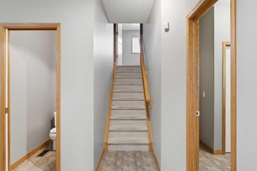545 Rocky Ridge Bay Nw, Calgary, AB - Indoor Photo Showing Other Room