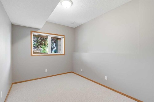545 Rocky Ridge Bay Nw, Calgary, AB - Indoor Photo Showing Other Room
