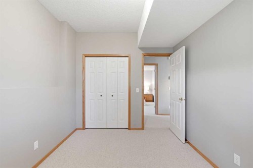 545 Rocky Ridge Bay Nw, Calgary, AB - Indoor Photo Showing Other Room