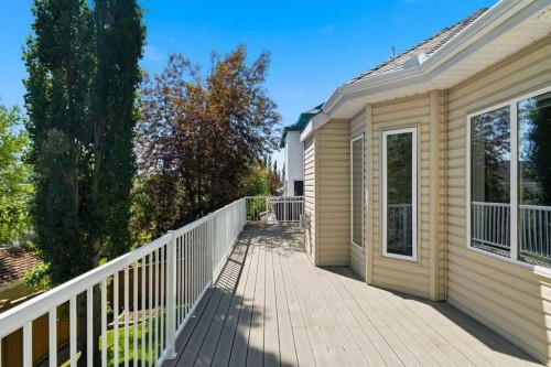 545 Rocky Ridge Bay Nw, Calgary, AB - Outdoor With Deck Patio Veranda With Exterior