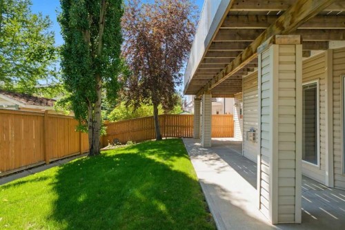 545 Rocky Ridge Bay Nw, Calgary, AB - Outdoor