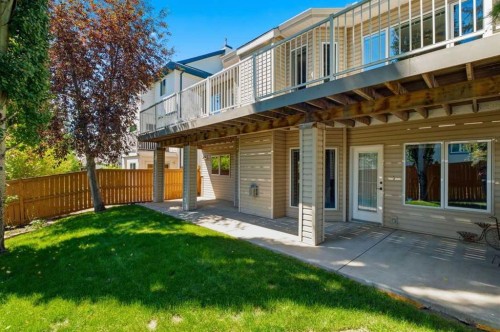 545 Rocky Ridge Bay Nw, Calgary, AB - Outdoor With Deck Patio Veranda