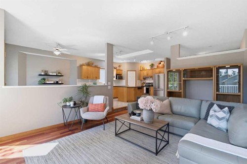 545 Rocky Ridge Bay Nw, Calgary, AB - Indoor Photo Showing Living Room