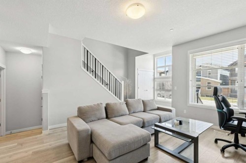 29 Howse Row Ne, Calgary, AB - Indoor Photo Showing Living Room