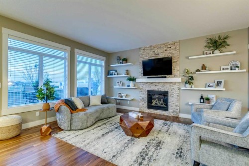 490 Mahogany Manor Se, Calgary, AB - Indoor Photo Showing Living Room With Fireplace