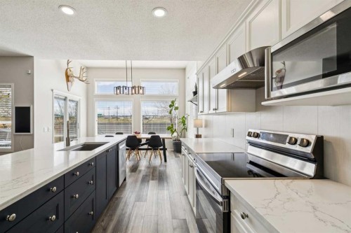 108 Somerside Crescent Sw, Calgary, AB - Indoor Photo Showing Kitchen With Double Sink With Upgraded Kitchen