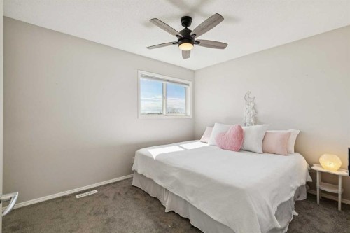108 Somerside Crescent Sw, Calgary, AB - Indoor Photo Showing Bedroom
