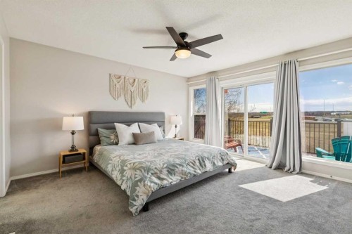 108 Somerside Crescent Sw, Calgary, AB - Indoor Photo Showing Bedroom
