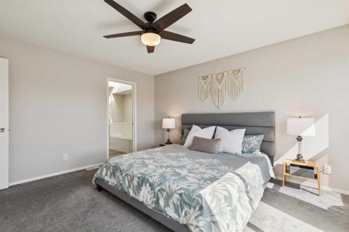 108 Somerside Crescent Sw, Calgary, AB - Indoor Photo Showing Bedroom