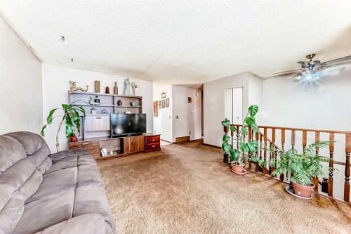 43 Mckenna Way Se, Calgary, AB - Indoor Photo Showing Living Room