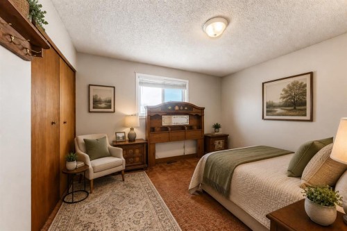 43 Mckenna Way Se, Calgary, AB - Indoor Photo Showing Bedroom