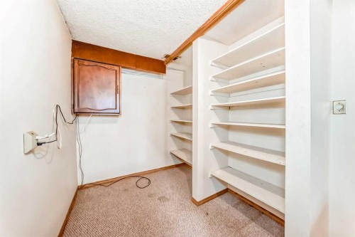 43 Mckenna Way Se, Calgary, AB - Indoor Photo Showing Other Room