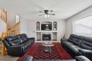 35 Saddletree Drive Ne, Calgary, AB  - Indoor Photo Showing Living Room With Fireplace 