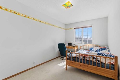 28 Sunlake Circle Se, Calgary, AB - Indoor Photo Showing Bedroom